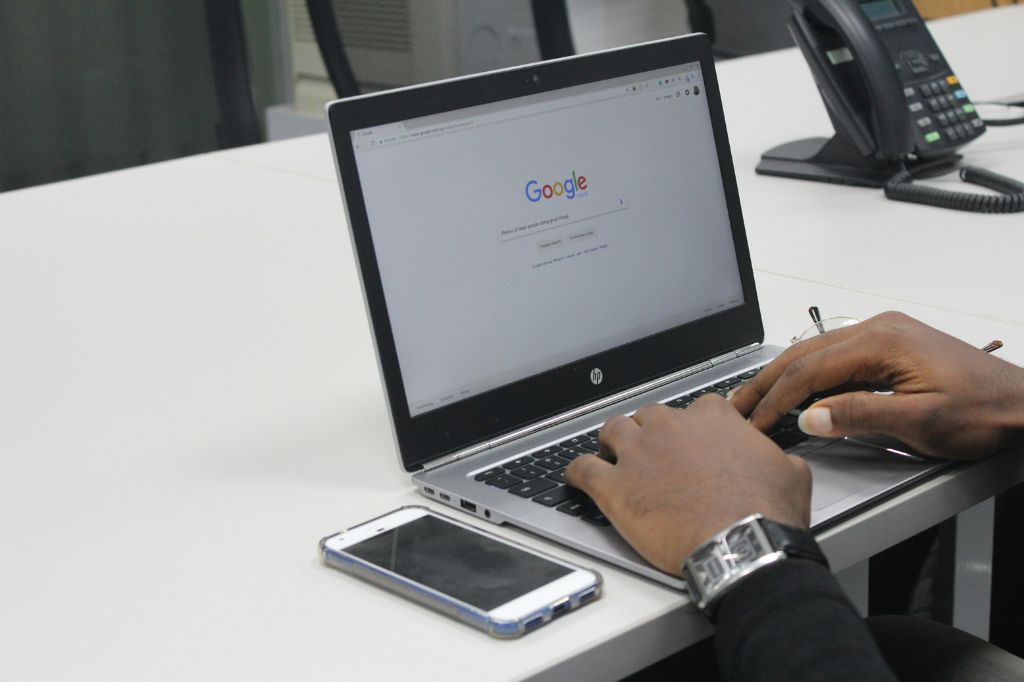 man using Google search tool