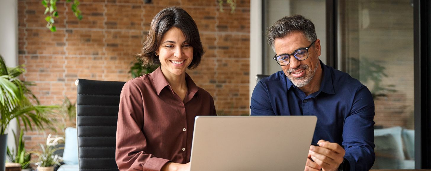 financial service advisors using laptop