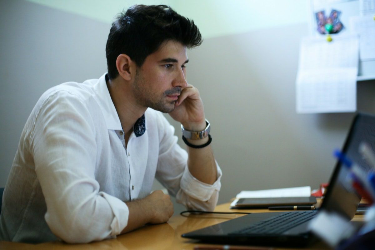 Financial advisor analyzing website conversion performance and lead generation metrics