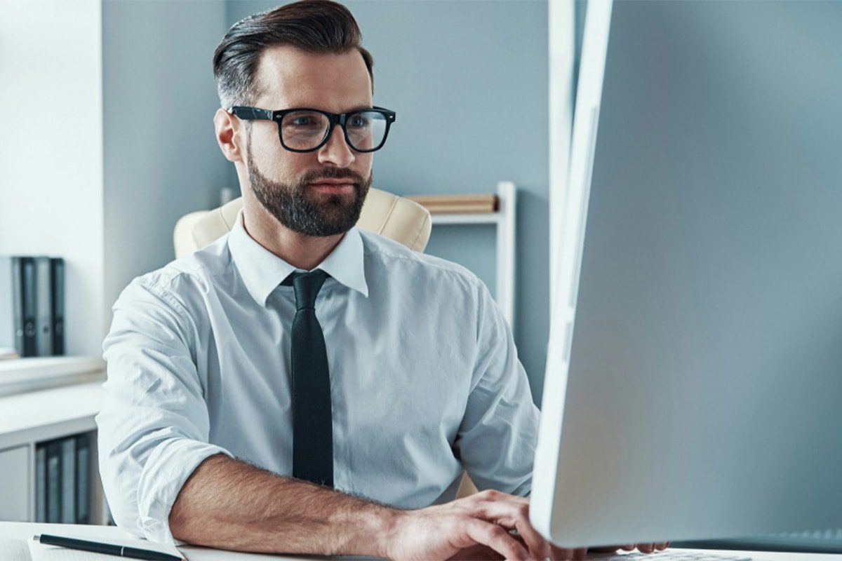 Financial advisor reviewing optimized website technical performance and conversion rates