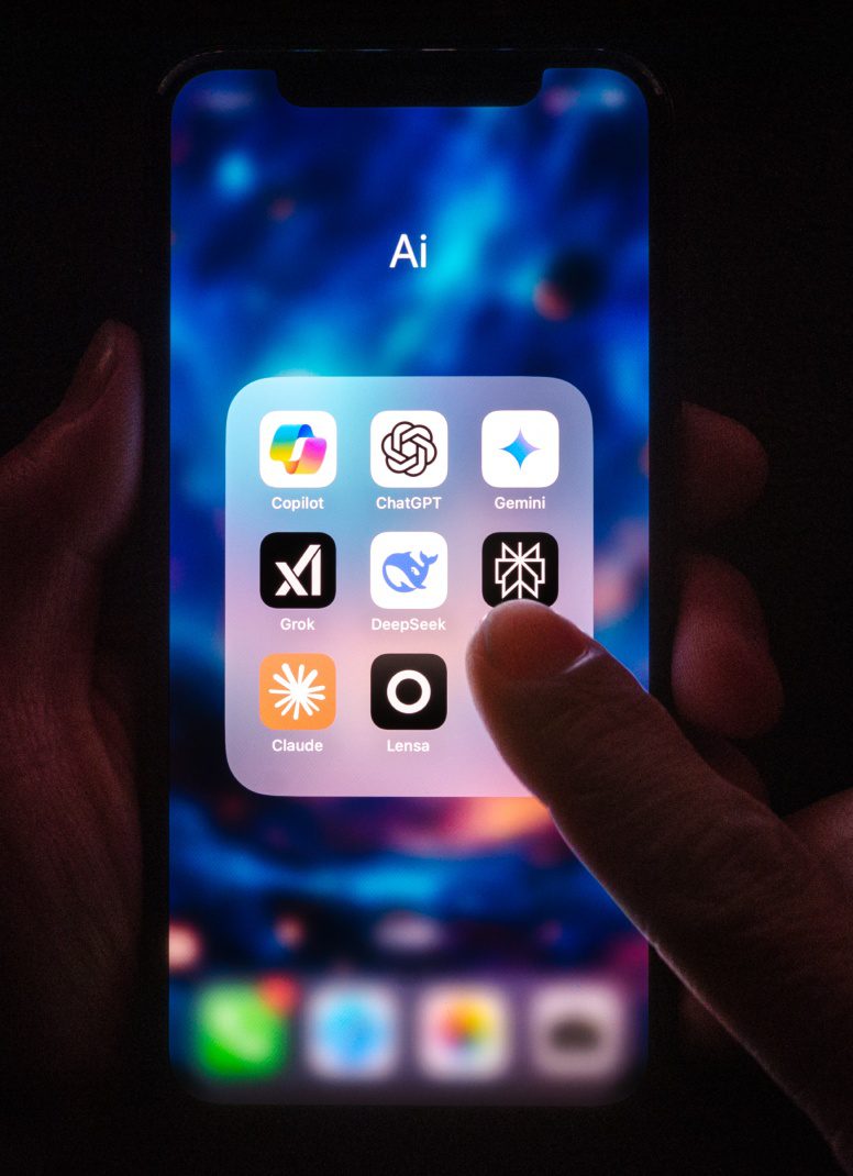 A smartphone screen showing a folder labeled AI with multiple AI app icons.